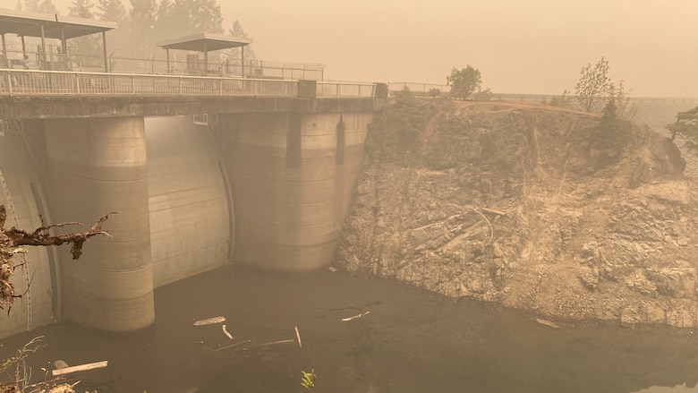 Smoke hangs heavy in the air around the Blue River Dam spillway Sept. 14; just days after the Holiday Farm Fire burned through the area; impacting Blue River and nearby Cougar Dam.