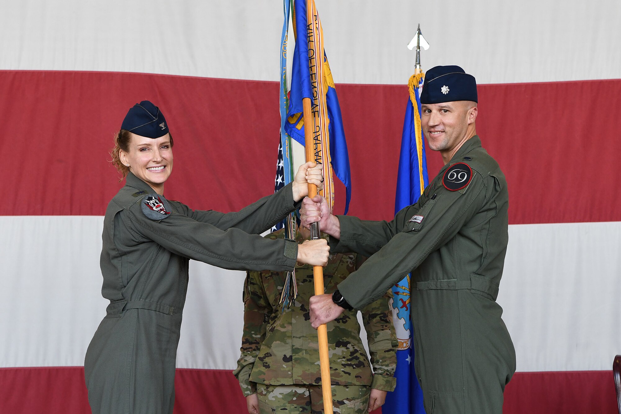 Lt. Col. Paul “Ballz” Killeen relinquished command to Lt. Col. Bradley “Vapor” Sullivan, the new 69 FS commander. The ceremony was presided over by Col. Trena Savageau, 944th Operations Group commander.