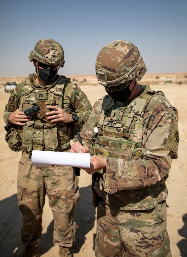 U.S. and Iraqi forces gather for the divestment of equipment from the U.S. government to the government of Iraq at a transfer point near Al Asad Air Base, Iraq, Oct. 15, 2020. Iraqi Maj. Gen. Saadoom Fouad, Q-West Air Base commander, received several containers consisting of air traffic control equipment that will build the Iraqi air force's capability to continue the fight to defeat the Islamic State of Iraq and Syria.(U.S. Army Reserve photo by Spc. Jorge Reyes)