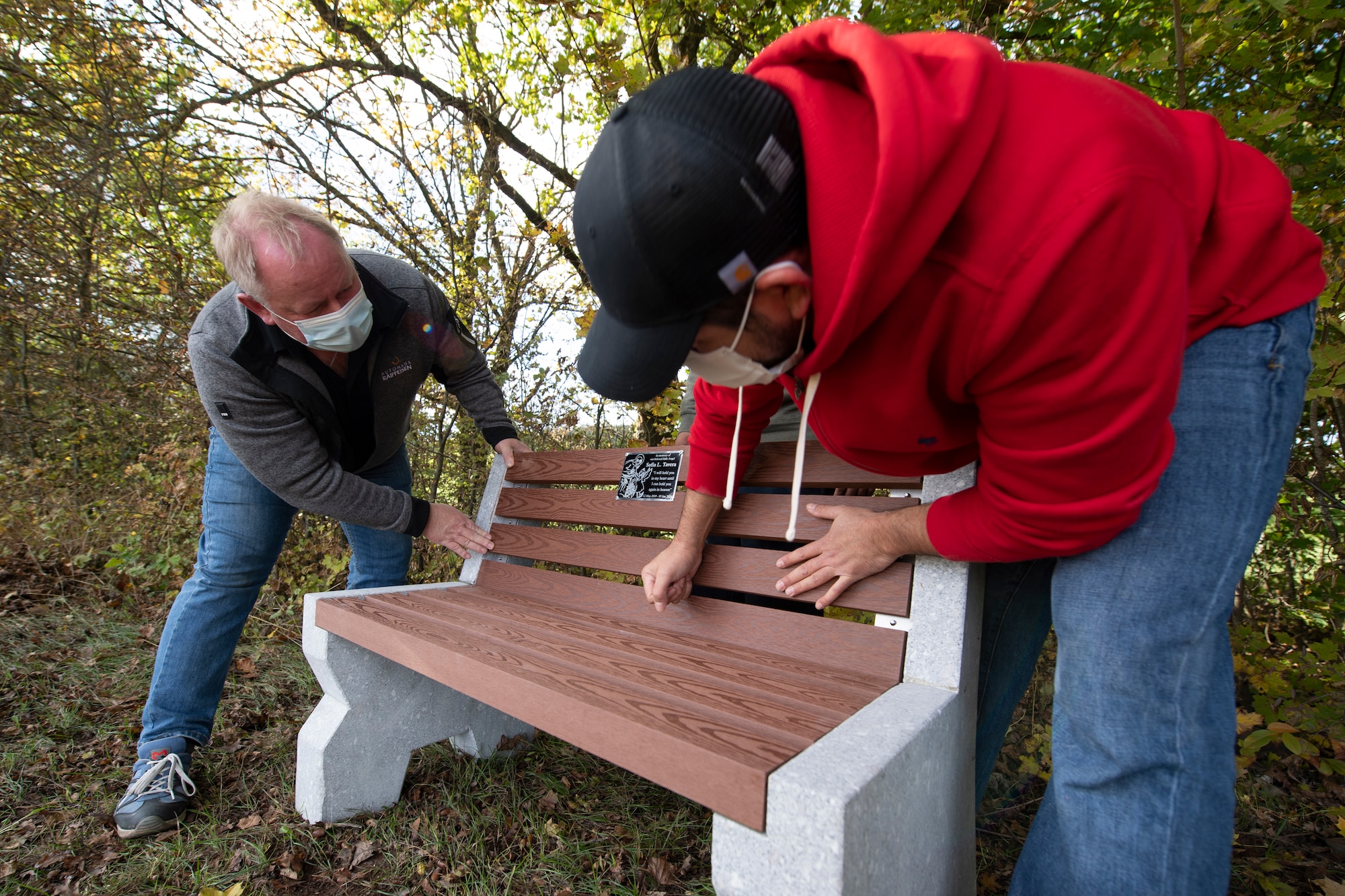 It was along the side of a small road in Binsfeld, among the newly fallen leaves and the cool, autumn air that Liliana, her husband, Javier, and several family members began constructing a bench Oct. 10