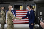 Lars Olson recites the enlistment oath at the headquarters of 3rd Battalion, 142nd Aviation at Army Aviation Support Facility #3, in Latham, N.Y. Olson will be the first "street-to-seat" member of the N.Y. Army National Guard, going directly from Warrant Officer Candidate School to Initial Entry Rotary Wing Training rather than serving for a while before becoming a pilot.