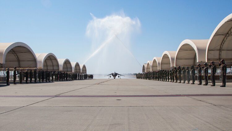 A U.S. Marine taxis down the flightline in an AV-8B Harrier II during Lt. Col. Keith Bucklew’s last flight as commanding officer of Marine Attack Squadron 311 at Marine Corps Air Station Yuma, Ariz., Oct. 14.