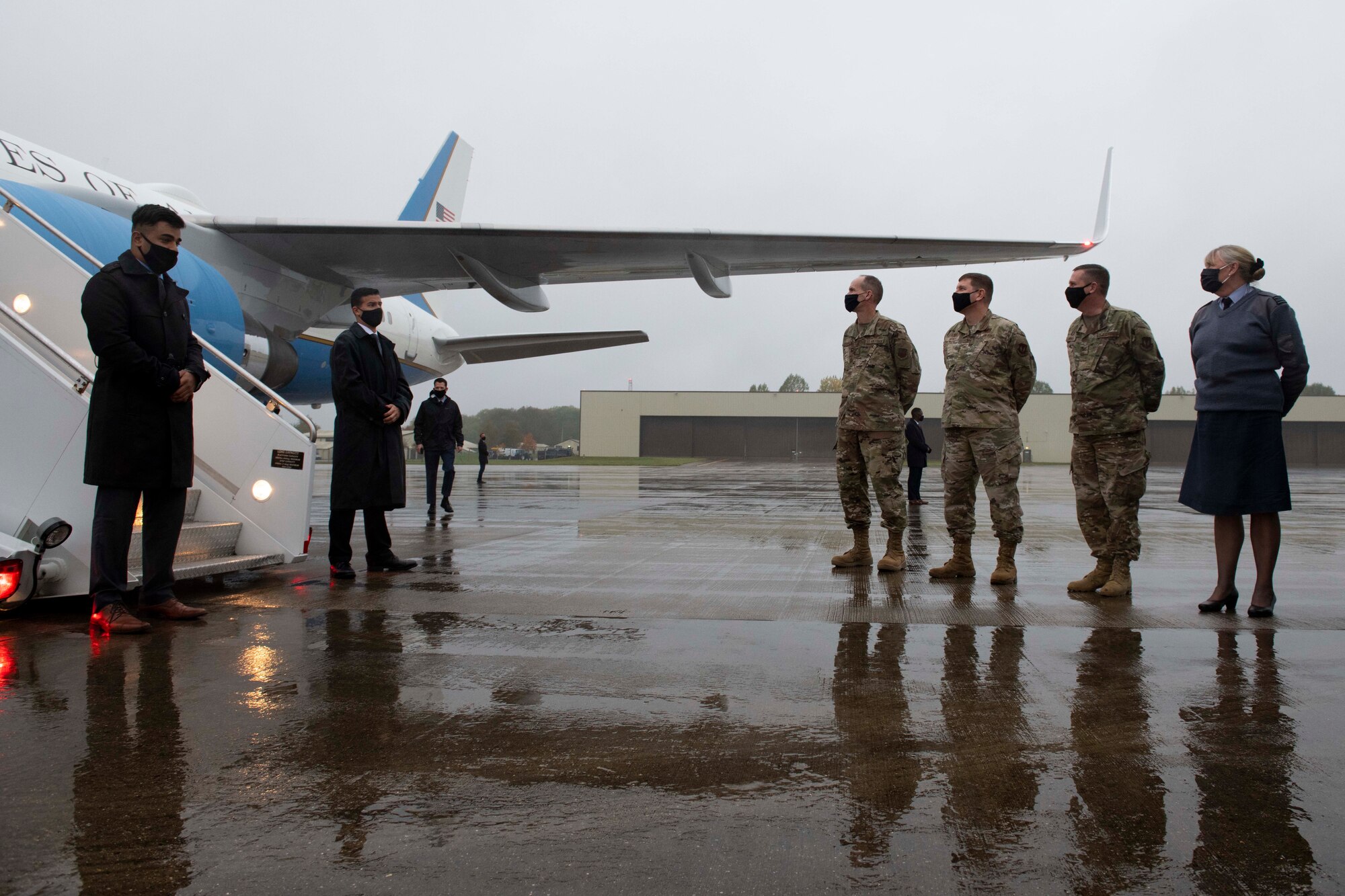 Brig. Gen. Jefferson J. O'Donnell, fourth right, U.S. European Command senior defense official and defense attaché, U.S. Air Force Col. Kurt Wendt, third right, 501st Combat Support Wing commander, U.S. Air Force Col. Jon Hannah, second right, 422nd Air Base Group commander, and Royal Air Force Sqn. Ldr. Jayne Robertson, right, RAF Fairford RAF commander, welcome Deputy Secretary of Defense David L. Norquist during his visit to RAF Fairford, England, Oct. 12, 2020. The visit highlighted the strategic importance of RAF Fairford, oriented him to the bomber and ISR missions in support of U.S. European Command and national defense strategy, and gave him the opportunity to engage with Airmen. (U.S. Air Force photo by Senior Airman Jennifer Zima)