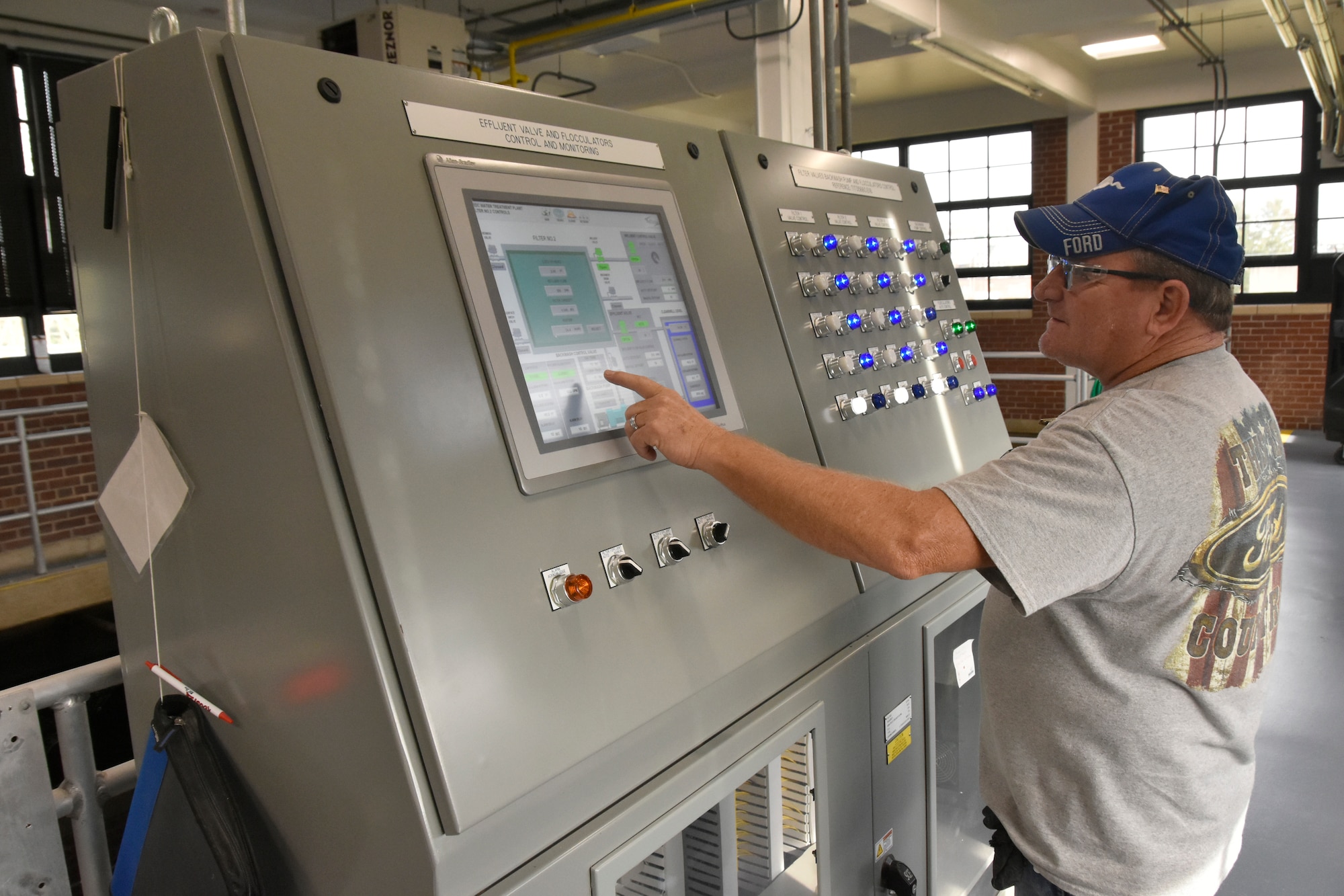 Frankie Hill, lead operator at the Arnold Air Force Base Water Treatment Plant, works on the new control panel Oct. 8, 2020, installed at the plant during a multimillion-dollar renovation project. The recently-completed renovations included cosmetic, quality of life, infrastructure and operating system upgrades. (U.S. Air Force photo by Bradley Hicks)
