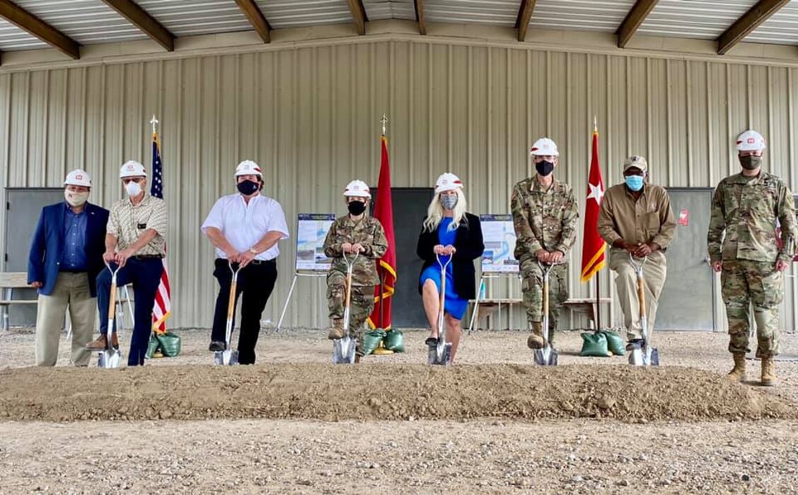 MRC Commissioners and local partners attend a groundbreaking ceremony