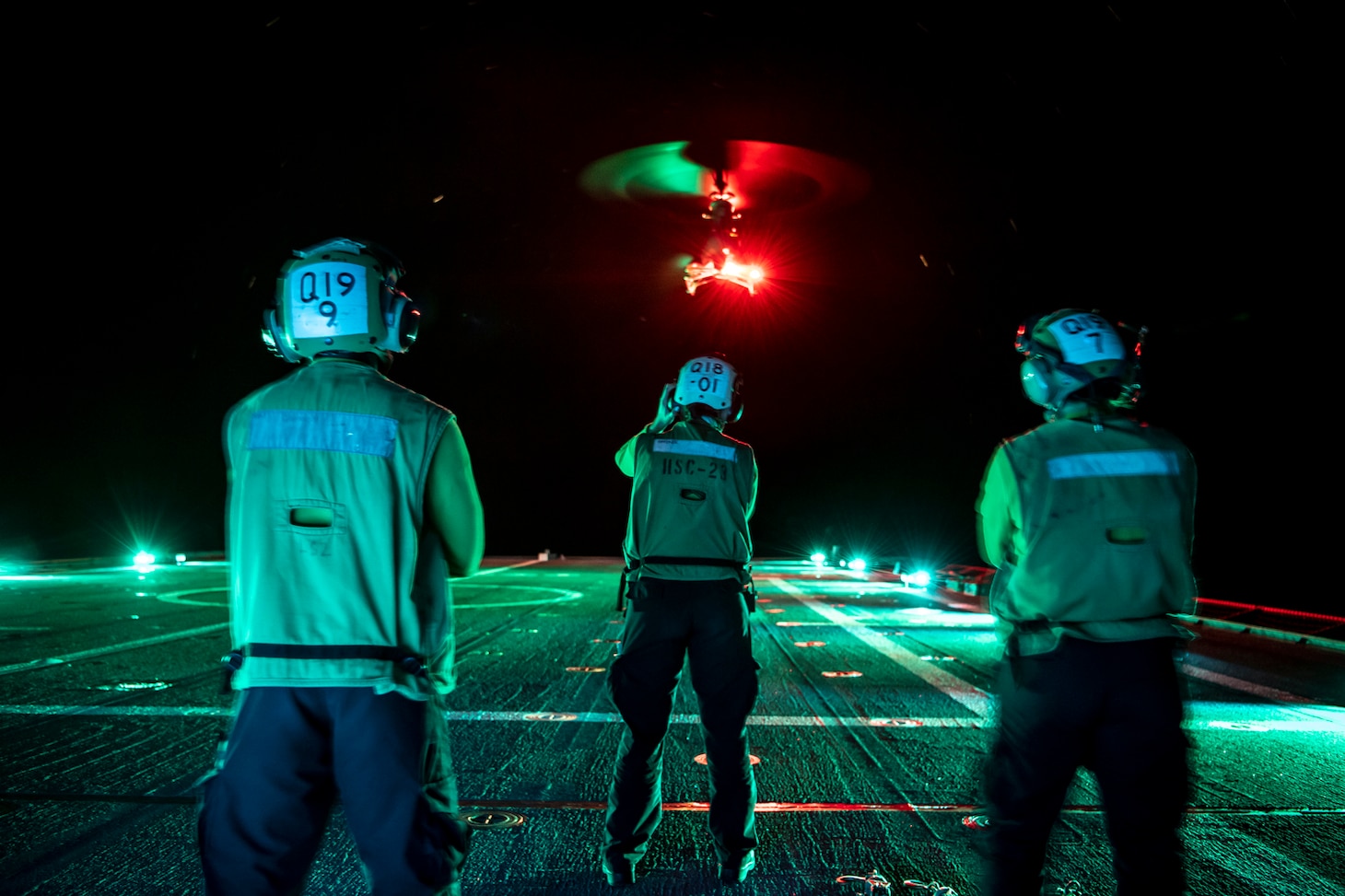Sailors assigned to the �Wildcards� of Helicopter Combat Squadron (HSC) 23 watch as an MQ-8B Fire Scout takes off aboard the Independence-class littoral combat ship USS Gabrielle Giffords (LCS 10) Oct. 10, 2020.