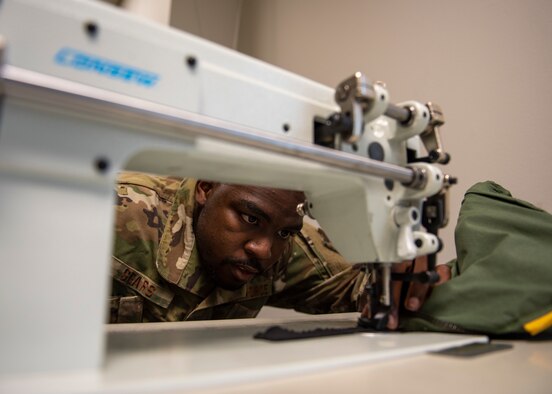 Senior Airman Zaquantai Sears, 4th Operations Support Squadron aircrew flight equipment journeyman, modifies a G-suit for flight in order to maintain combat readiness at Seymour Johnson Air Force Base, North Carolina, Sept. 8, 2020.