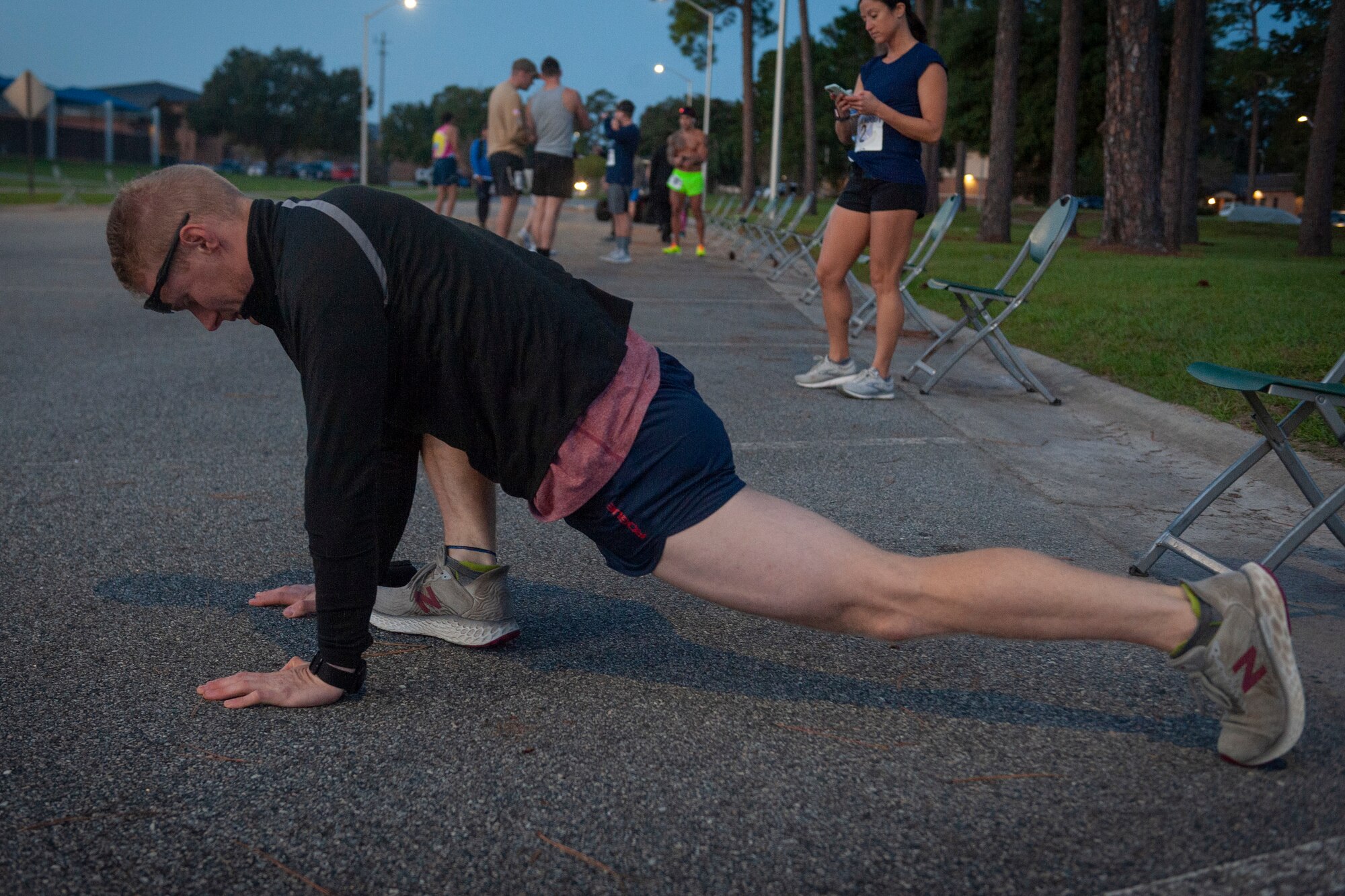 Photo of an Airman stretching