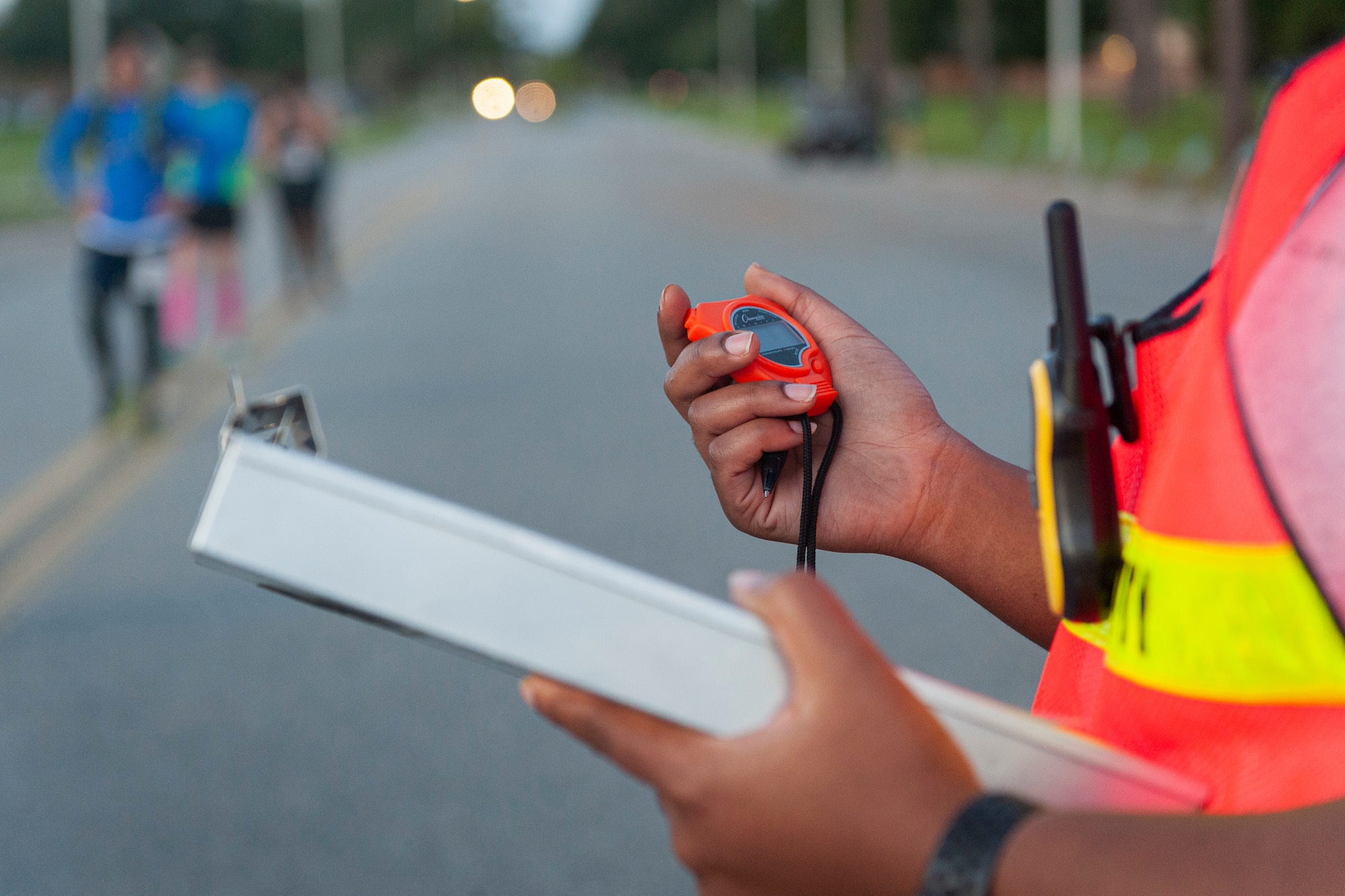 Photo of an Airman controlling a stopwatch