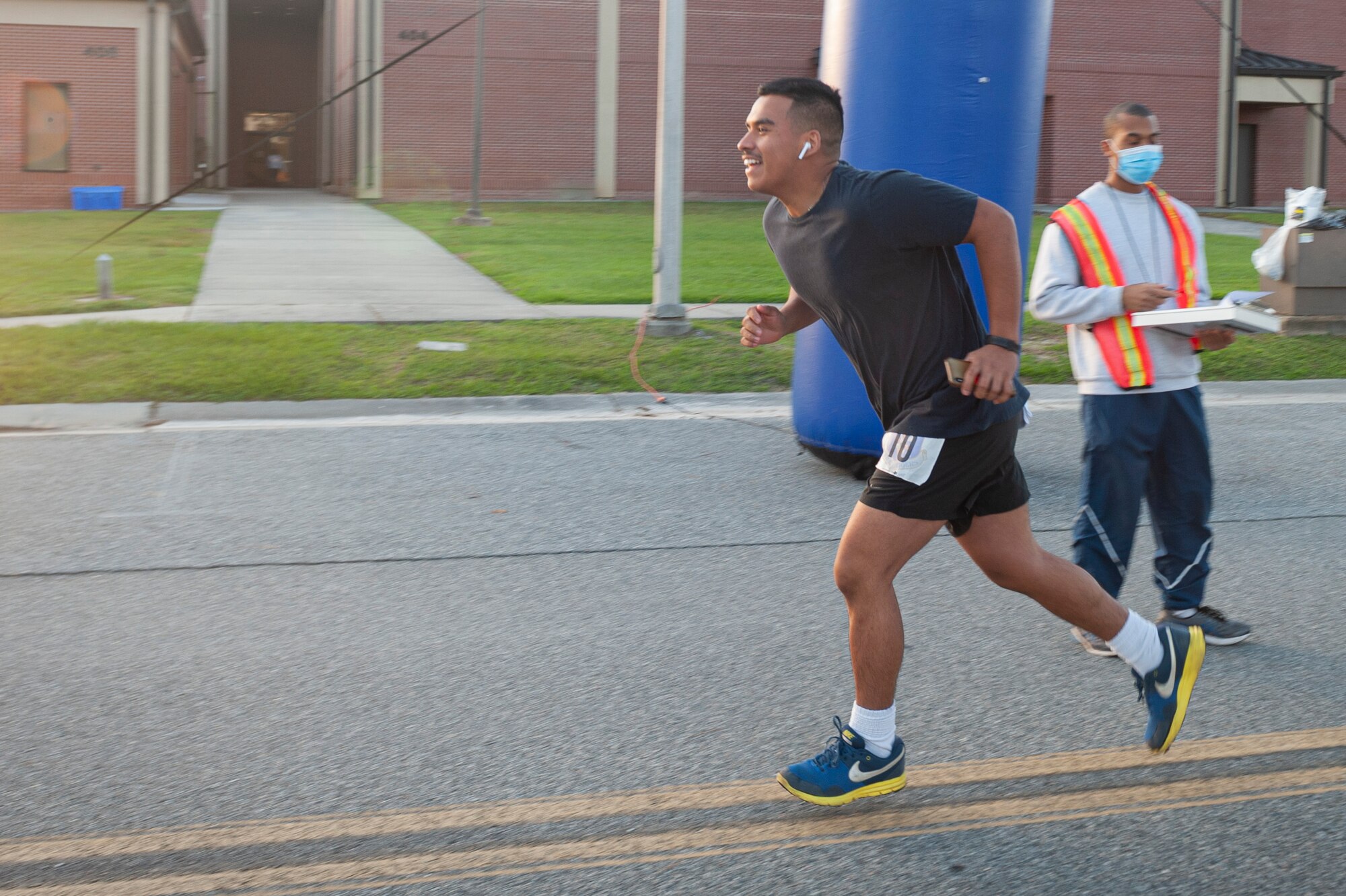 Photo of an Airman running