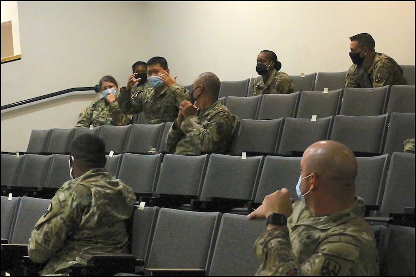 Maj. Yifei Zhang, a G-1 officer at the 377th Theater Sustainment Command, highlights some of his experiences as a Chinese American during a forum at the headquarters building in Belle Chasse, La., Oct. 14, 2020. The 377th Theater Sustainment Command serves as the logistics lead on behalf of U.S. Army North for the nationwide COVID-19 response.