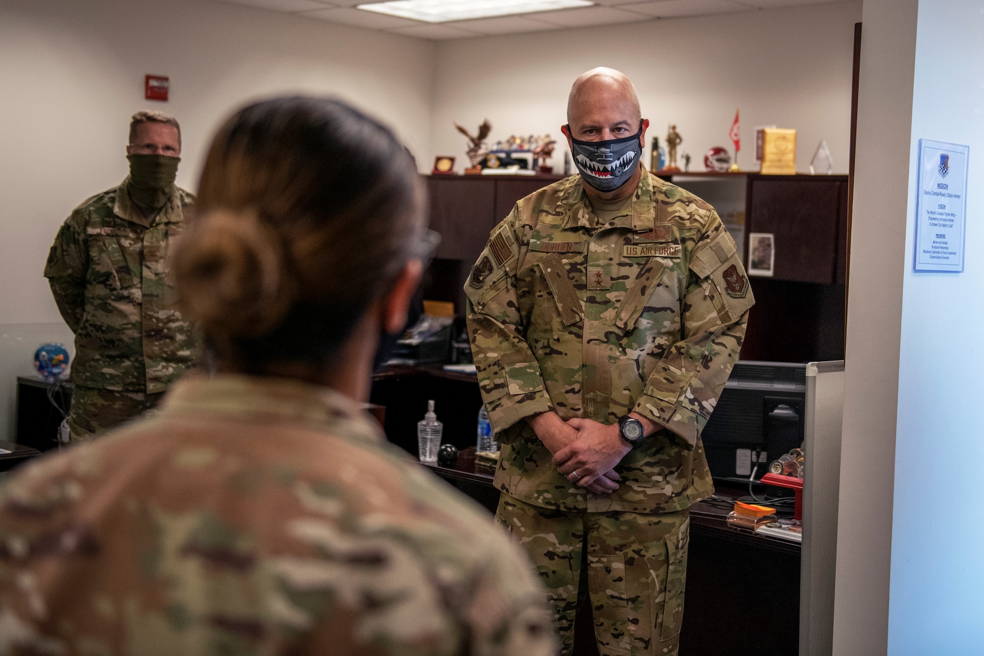 Maj. Gen. Brian Borgen, 10th Air Force commander, speaks with Senior Master Sgt. Dolores Beard, superintendent of plans and programs in the 419th Security Forces Squadron
