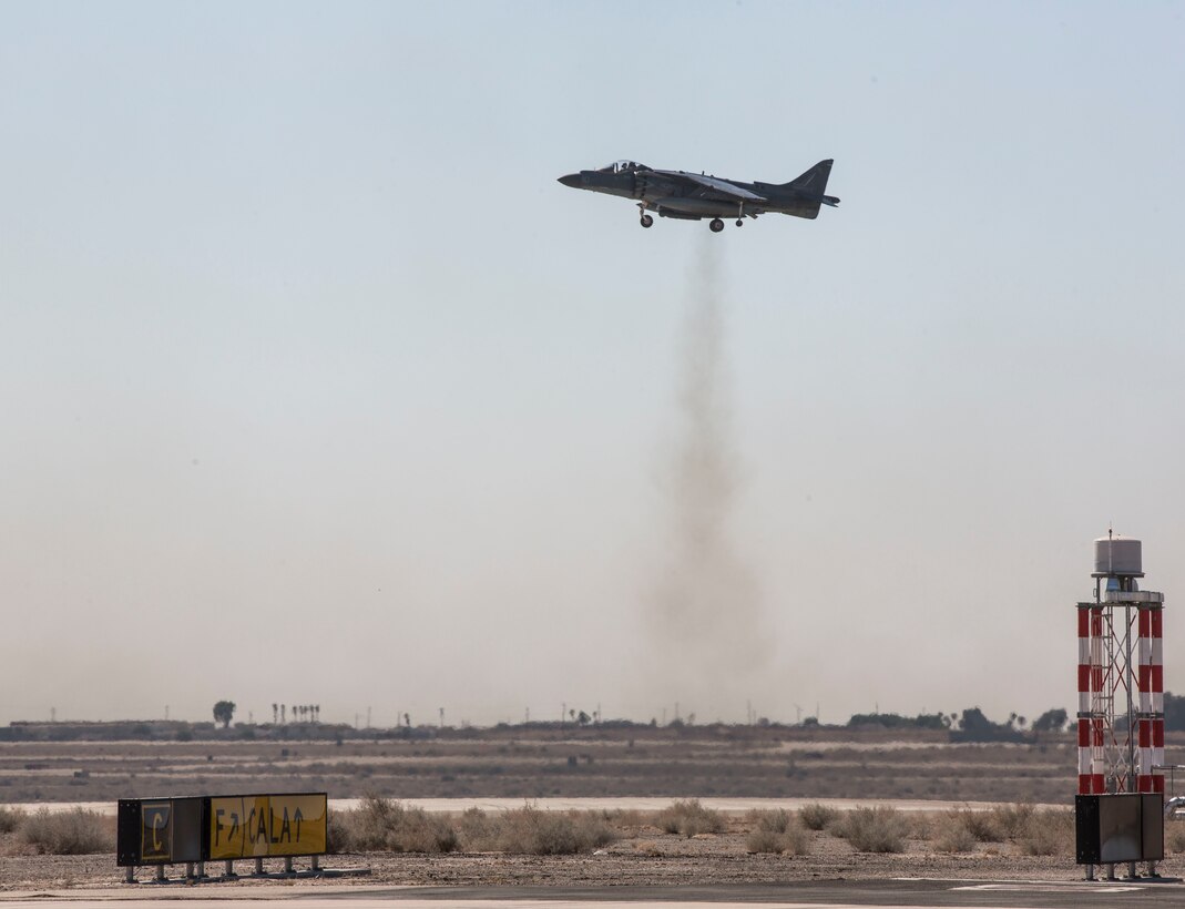 U.S. Marine Corps Lt. Col. Keith Bucklew, commanding officer of Marine Attack Squadron 311, hovers in an AV-8B Harrier II assigned to VMA-311, Marine Aircraft Group 13, 3rd Marine Aircraft Wing, during his last flight at Marine Corps Air Station Yuma, Ariz., Oct. 14, 2020.