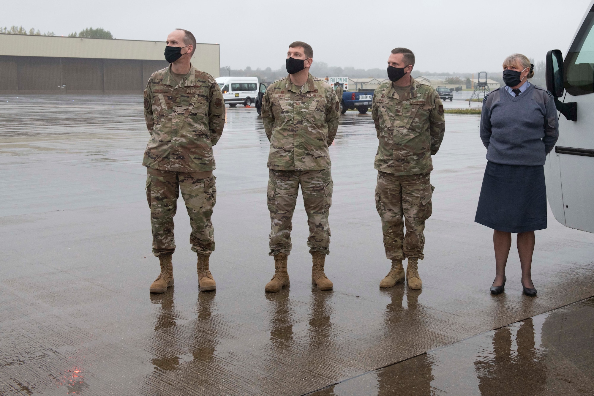 Brig. Gen. Jefferson J. O'Donnell, left, U.S. European Command senior defense official and defense attaché, U.S. Air Force Col. Kurt Wendt, second left, 501st Combat Support Wing commander, U.S. Air Force Col. Jon Hannah, (center right) 422nd Air Base Group commander, and Royal Air Force Sqn. Ldr. Jayne Robertson, right, RAF Fairford RAF commander, welcome Deputy Secretary of Defense David L. Norquist during his visit to RAF Fairford, England, Oct. 12, 2020. The visit highlighted the strategic importance of RAF Fairford, oriented him to the bomber and ISR missions in support of U.S. European Command and national defense strategy, and gave him the opportunity to engage with Airmen. (U.S. Air Force photo by Senior Airman Jennifer Zima)