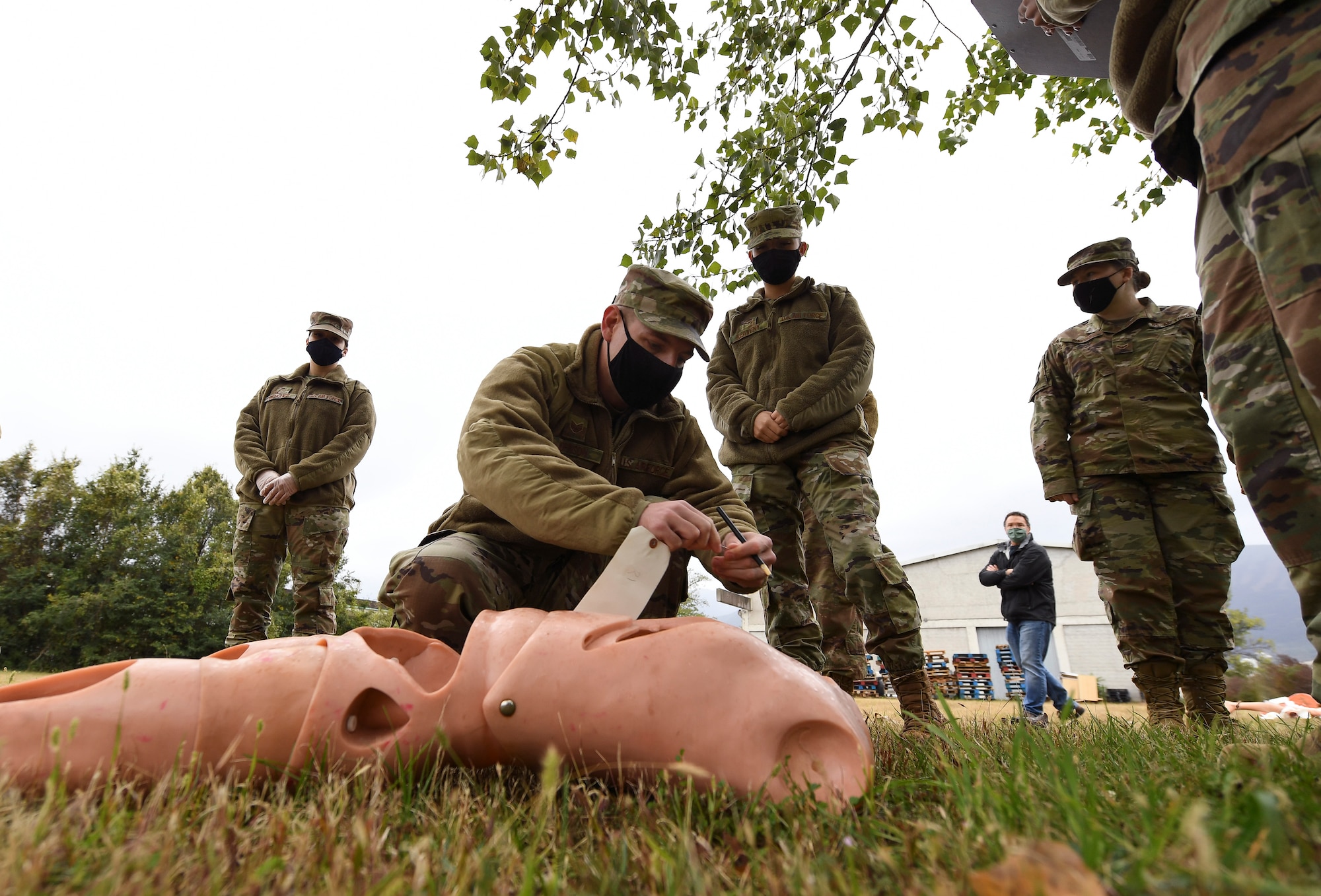 U.S. Air Force Staff Sgt. Brandon Johnson, 31st Force Support Squadron dining facility assistant manager, identifies remains during search and recovery training at Aviano Air Base, Italy, Oct. 15, 2020. Maintaining currency through training events such as search and recovery and home-station readiness training enables Airmen to stay mission ready in order to execute any real-world agile combat employment, dynamic force employment, and search and recovery operations. (U.S. Air Force photo by Staff Sgt. Savannah L. Waters)