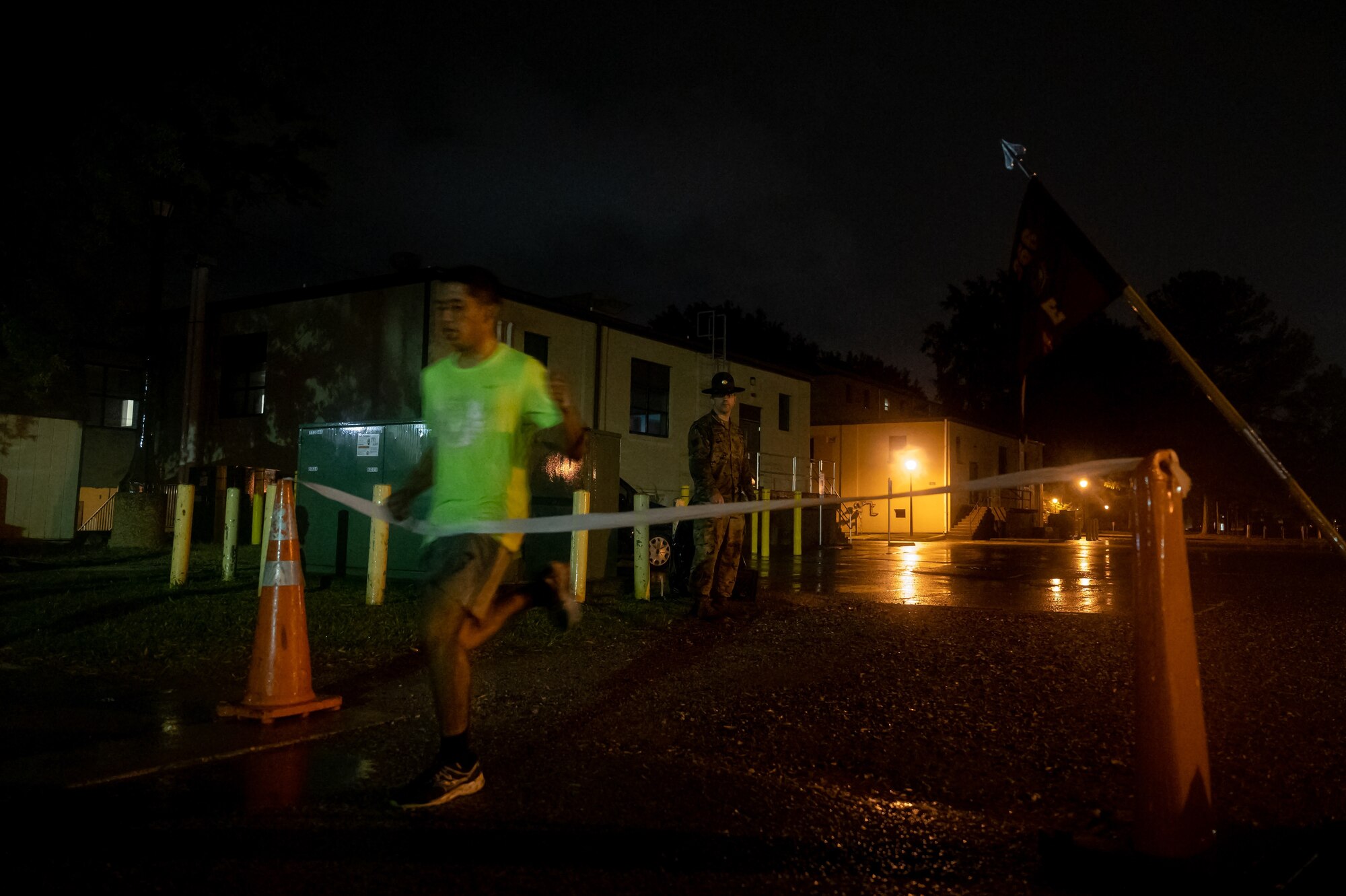 A Solider crosses the finish line of the Army Ten-Miler at Ft. Eustis.