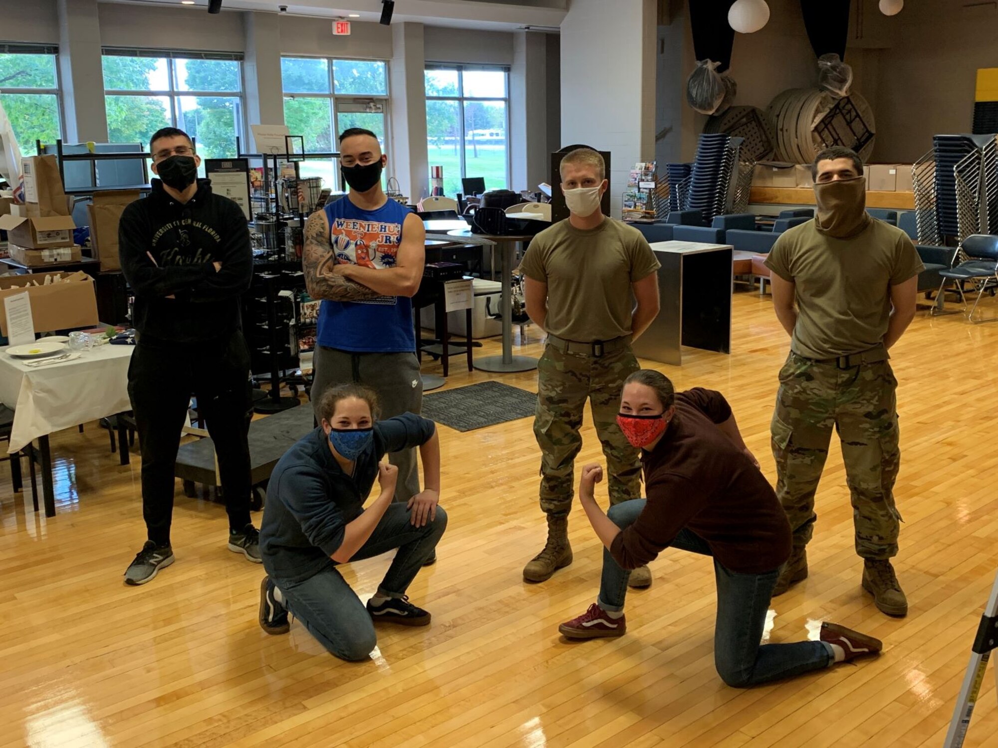 Students from the 88th Medical Group’s Medical Laboratory Apprentice Phase II Program move furniture at the Wright-Patt USO Center on Oct. 8 to help prepare the center for its phased reopening, starting Oct. 19.