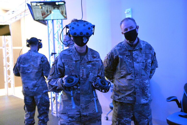 commander wearing virtual reality headset and VR hand wands