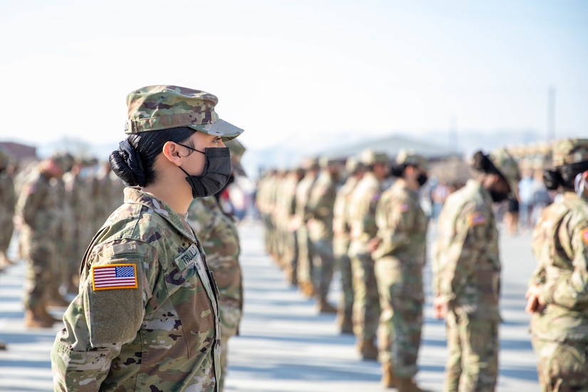 Service members lined up at attention