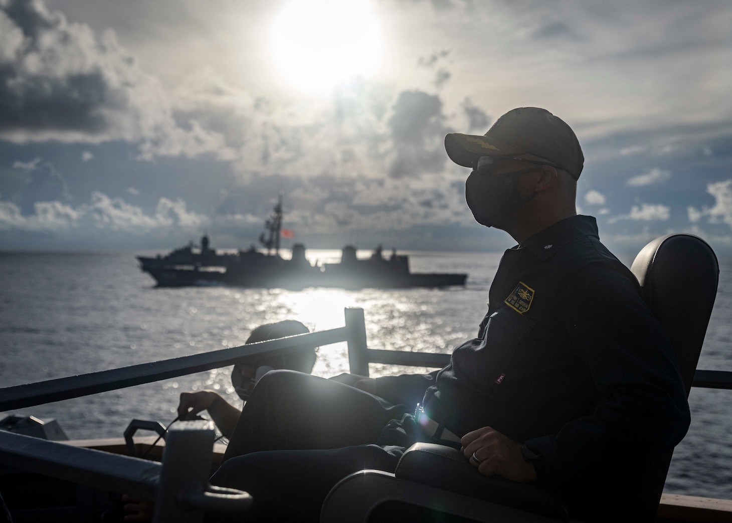 The U.S., JMSDF, and Royal Australian Navy conduct trilateral exercises in the South China Sea.