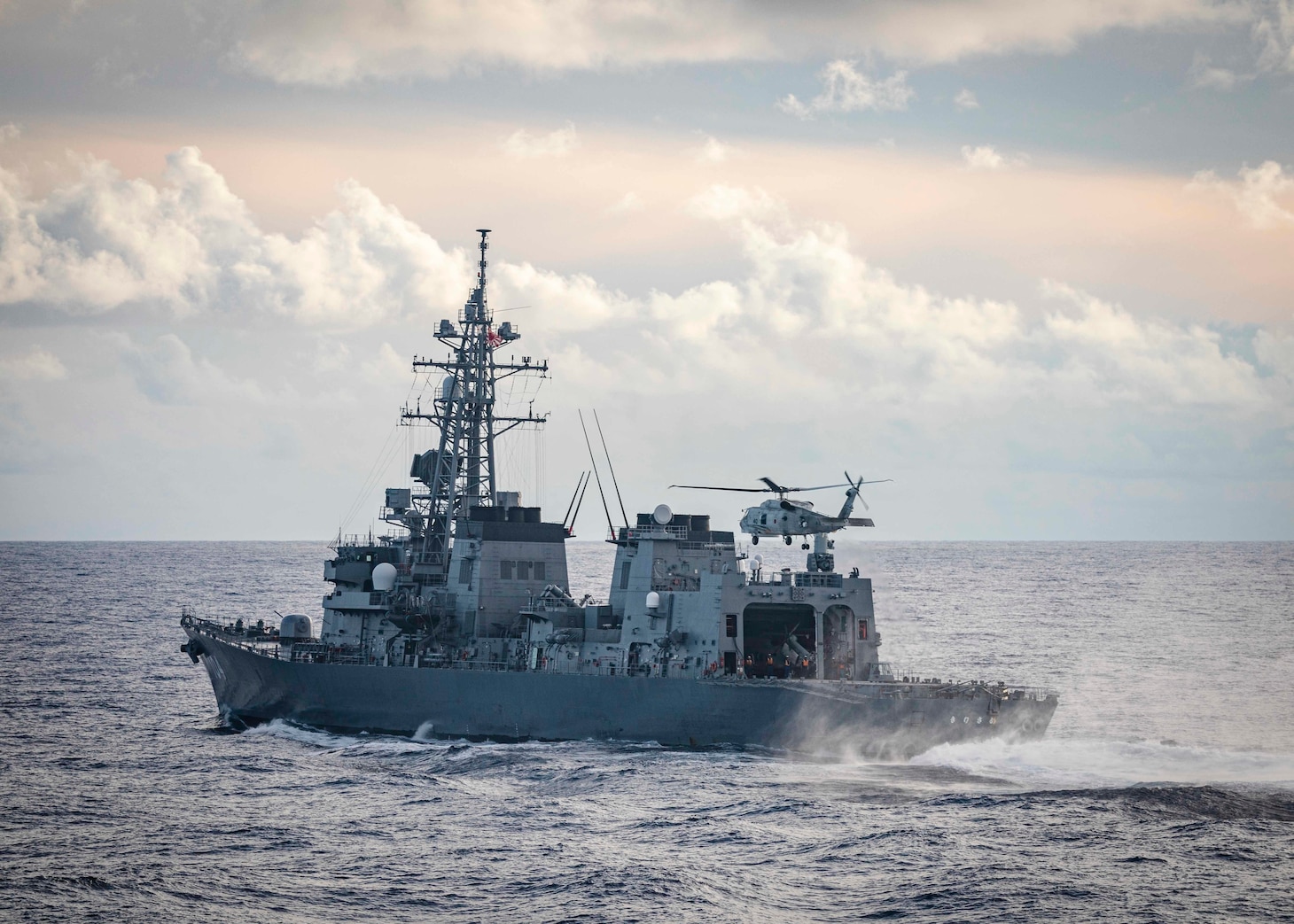 The U.S., JMSDF, and Royal Australian Navy conduct trilateral exercises in the South China Sea.