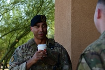 A photo of two cops talking