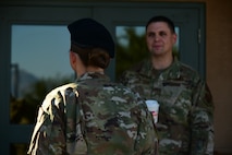 A photo of two cops talking