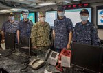 Vice Adm. Hideki Yuasa, commander in chief, Self Defense Fleet, Japan Maritime Self Defense Force, (center right) visits the Enforcement Coordination Cell (ECC) watch floor alongside members of his team and U.S. 7th Fleet ECC Director, Capt. James J. Mehail, during a visit to the 7th Fleet command ship, USS Blue Ridge (LCC 19). As the U.S. Navy’s largest forward-deployed fleet, there are roughly 50-70 ships and submarines, 150 aircraft, and approximately 20,000 Sailors operating in the 7th Fleet area of operations.