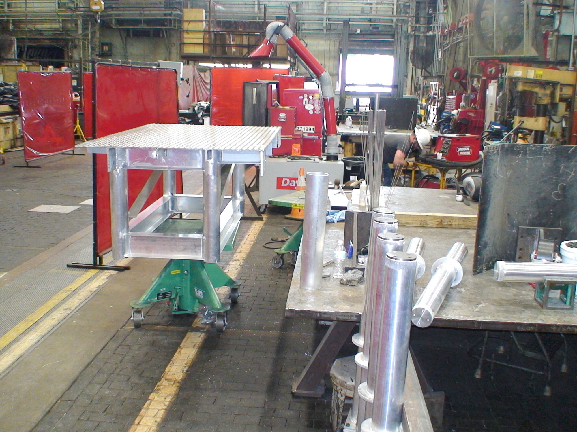 An aluminum platform system, shown here June 22, 2020, prior to having legs installed, is welded by ironworkers with the Arnold Engineering Development Complex (AEDC) Model and Machine Shop as part of a request for the C-2 Engine Test Cell at Arnold Air Force Base, Tenn. (U.S. Air Force photo)