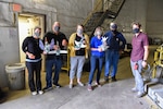 Members of this years’ Albert Einstein Distinguished Educator Fellowship (AEF) Program, a Department of Energy initiative that gives K-12 STEM educators the opportunity to work with various government agencies for one year, learn about SeaGlide on Sept. 25, 2020, in the David Taylor Model Basin at Naval Surface Warfare Center, Carderock Division in West Bethesda, Md. Pictured from left is AEFs Machin Norris, Mike Vargas, Suzy Otto and Laura Larkin; John Hamilton and Jeff Campana are Carderock employees who helped the AEFs with their SeaGlides.