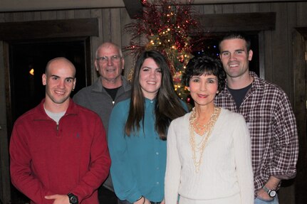 Capt. Mark “Tyler” Voss, far right, with his family for Christmas in 2012.