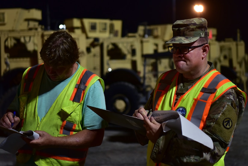 U.S. Army Sgt. 1st Class Will Twigg, an Operations NCOIC mobilized with the 841st Transportation Battalion, oversees equipment being offloaded from a cargo vessel to ensure all equipment is accounted for, at Joint Base Charleston’s Naval Weapons Station, S.C., Oct. 14, 2020. The 841st TB is an active duty, U.S. Army Surface Deployment and Distribution Command (SDDC) unit tasked with the execution of Task Force Deployment Operations.