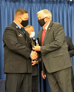 Sgt. Joshua Roth receives the Governor’s Medal from the 57th Governor of Missouri, Mike Parson. Roth, a sergeant in the Missouri National Guard, received the award for actions he took to save the life of a small child while on duty as a firefighter and Emergency Medical Technician in August of 2019.