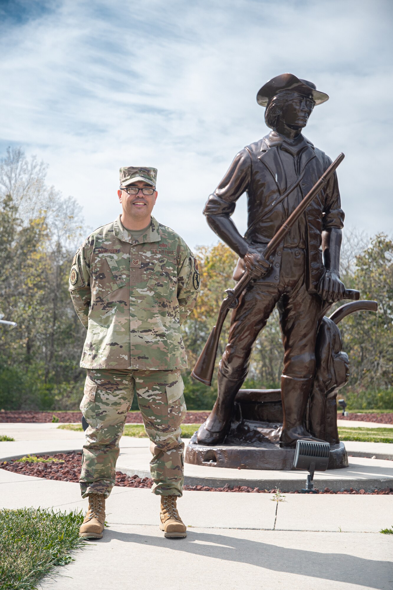 Tech. Sgt. Jarrett Rassmussen poses for a photo at the 131st Bomb Wing Heritage Park on Whiteman AFB, Missouri, Oct. 17, 2020. Rasmussen was recently named the Missouri Air National Guard's Recruiter of the Year for enlisting 49 new Airmen in Fiscal Year 2020. (U.S. Air National Guard photo by Airman 1st Class Joseph Geldermann)