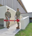 In honor of National Disability Employment Awareness Month, or NDEAM, the U.S. Army Medical Center of Excellence command team of Maj. Gen. Dennis LeMaster and Command Sgt. Maj. Clark Charpentier hosted a small-ribbon cutting setting Oct. 16 for the organization’s newly installed ADA compliant ramp that ensures better accessibility to and from the command headquarters building and Willis Hall at Joint Base San Antonio-Fort Sam Houston.