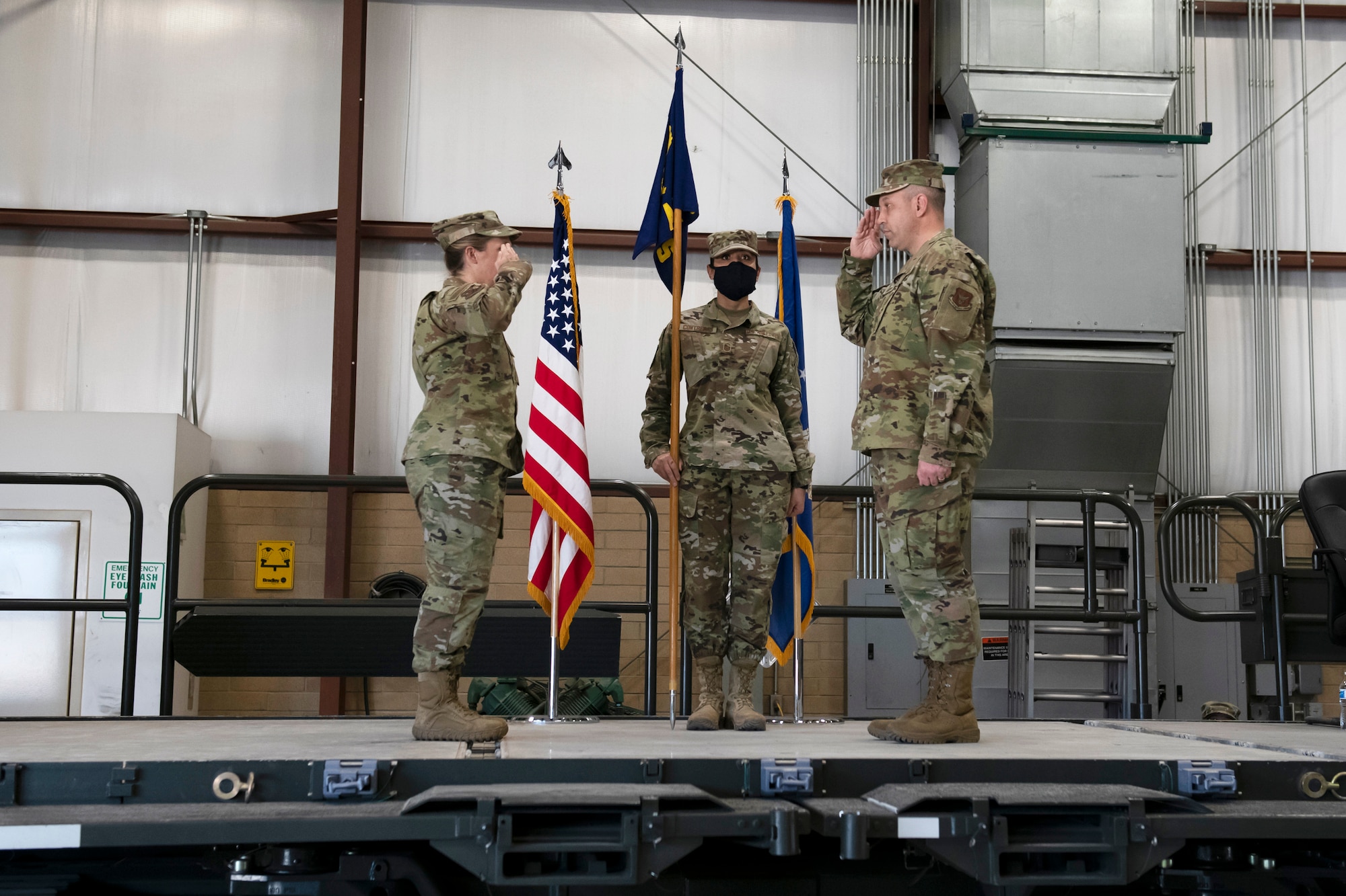Lt. Col. Jennifer Fiederer, 419th Mission Support Group commander, salutes Maj. Justin Thompson, the new commander of the 67th Aerial Port Squadron, during an assumption of command ceremony Oct. 18, 2020, at Hill Air Force Base, Utah.