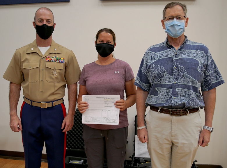 Marine Corps Logistics Base Albany Commanding Officer Col. Michael Fitzgerald officially signed for two unmanned aerial systems, making it the third Marine Corps Installations East base to receive drone kits, Oct. 2. (U.S. Marine Corps photo by Re-Essa Buckels)