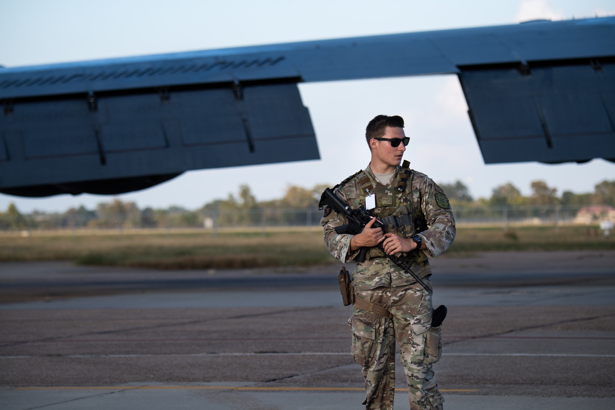 Airman 1st Class Jacob Oldfield, 2nd Security Forces Squadron entry controller, stands guard at an entry control point during Global Thunder 21 at Barksdale Air Force Base, La., Oct. 20, 2020. Exercises like GLOBAL THUNDER involve extensive planning and coordination to provide unique training opportunities for assigned units and forces. (U.S. Air Force photo by Airman 1st Class Jacob B. Wrightsman)