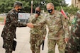 Maj. Gen. Daniel R. Walrath (right), commanding General, U.S. Army South, greets Brig. Gen. Otávio Rodrigues de Miranda Filho (left), 5th deputy chief of staff of the Brazilian Army and the head of delegation for Brazil during the U.S., Brazil army-to-army staff talks at Army South Headquarters at Joint Base San Antonio-Fort Sam Houston Oct. 20.