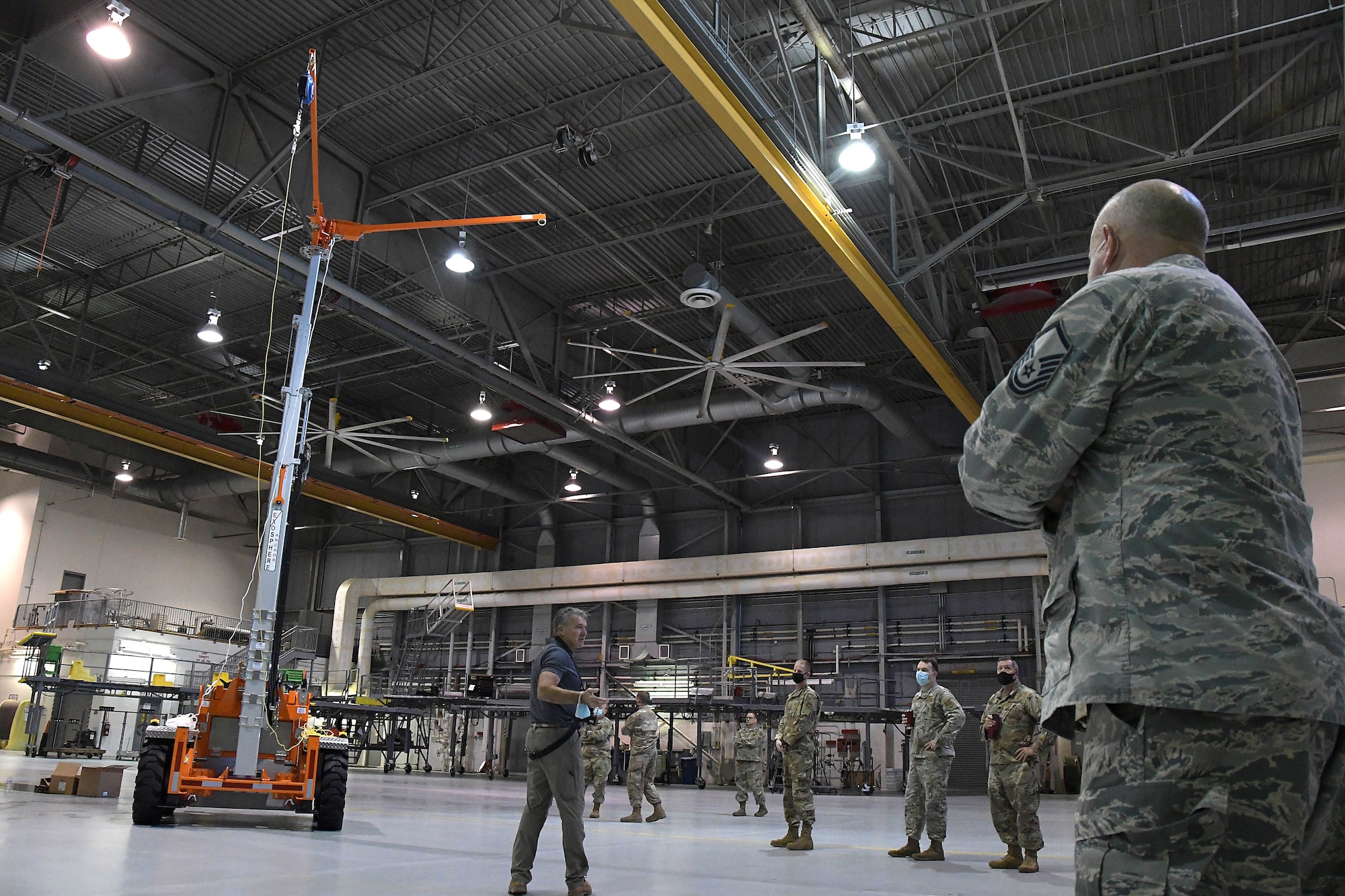 A contractor demonstrates the capabilities of the new fall protection system during a training session at Dobbins Air Reserve Base, Georgia, Oct. 16, 2020. The 94th Aircraft Maintenance Squadron recently acquired several mobile fall protection systems to improve the safety of maintainers and operators as they perform their duties on the aircraft. (U.S. Air Force photo/Andrew Park)