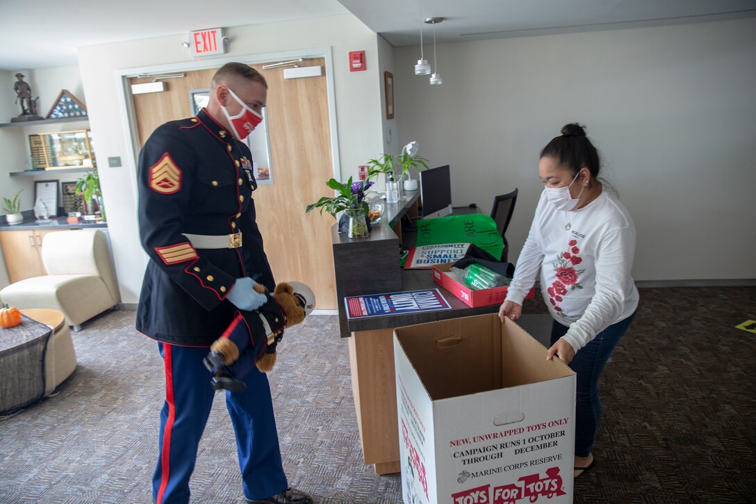A U.S. Marine delivers donation boxes to the Guam Chamber of Commerce to commence the 2020 Toys for Tots Campaign on Oct. 14.