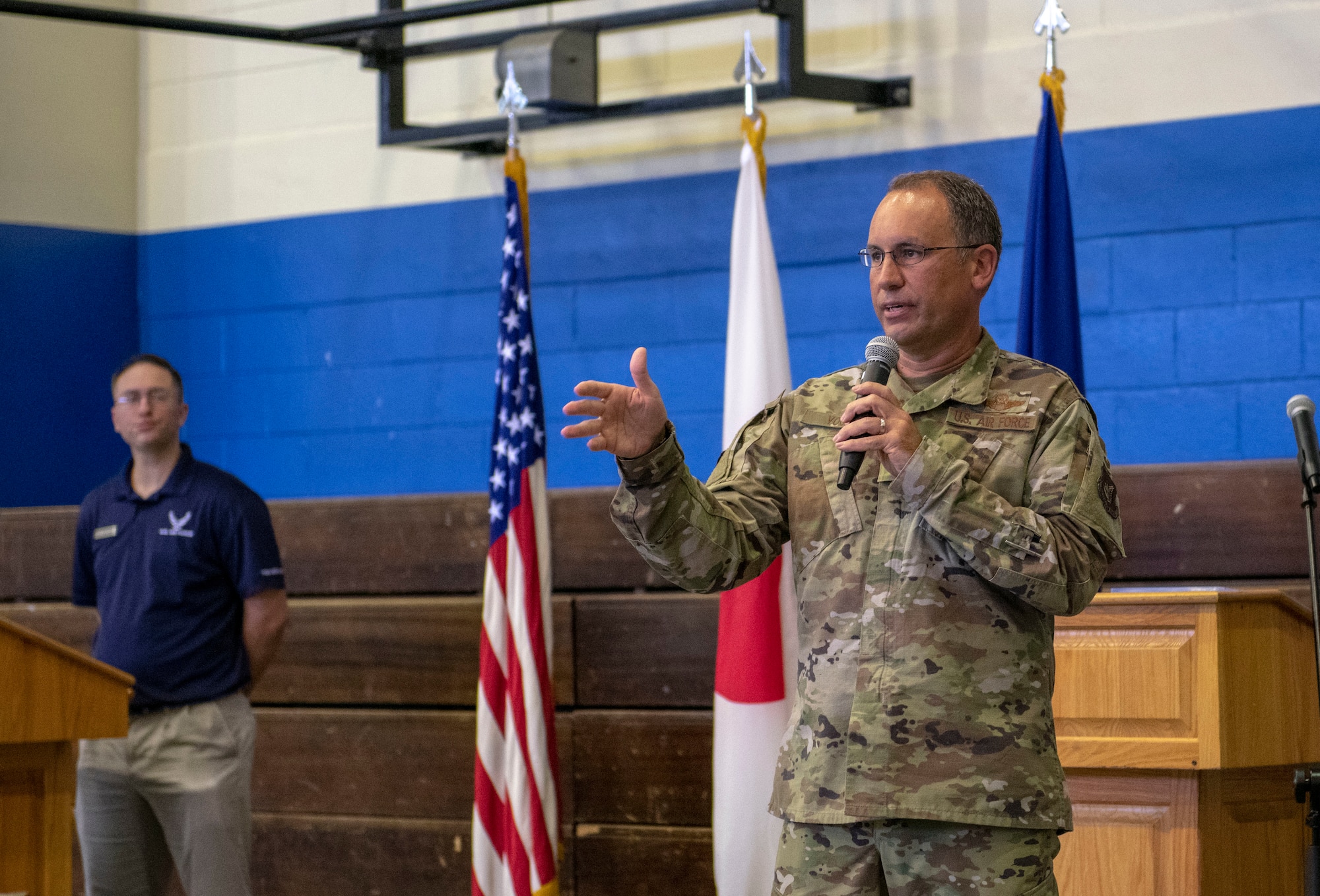 U.S. Air Force Col. George Vogel, 18th Wing vice commander, gives the grand opening speech at the new Habu Fitness Center at Kadena Air Base, Japan, Oct. 22, 2020. The Fitness Center will feature state of the art cardio equipment, free weights and basketball and volleyball courts. (U.S. Air Force photo by Naoto Anazawa)