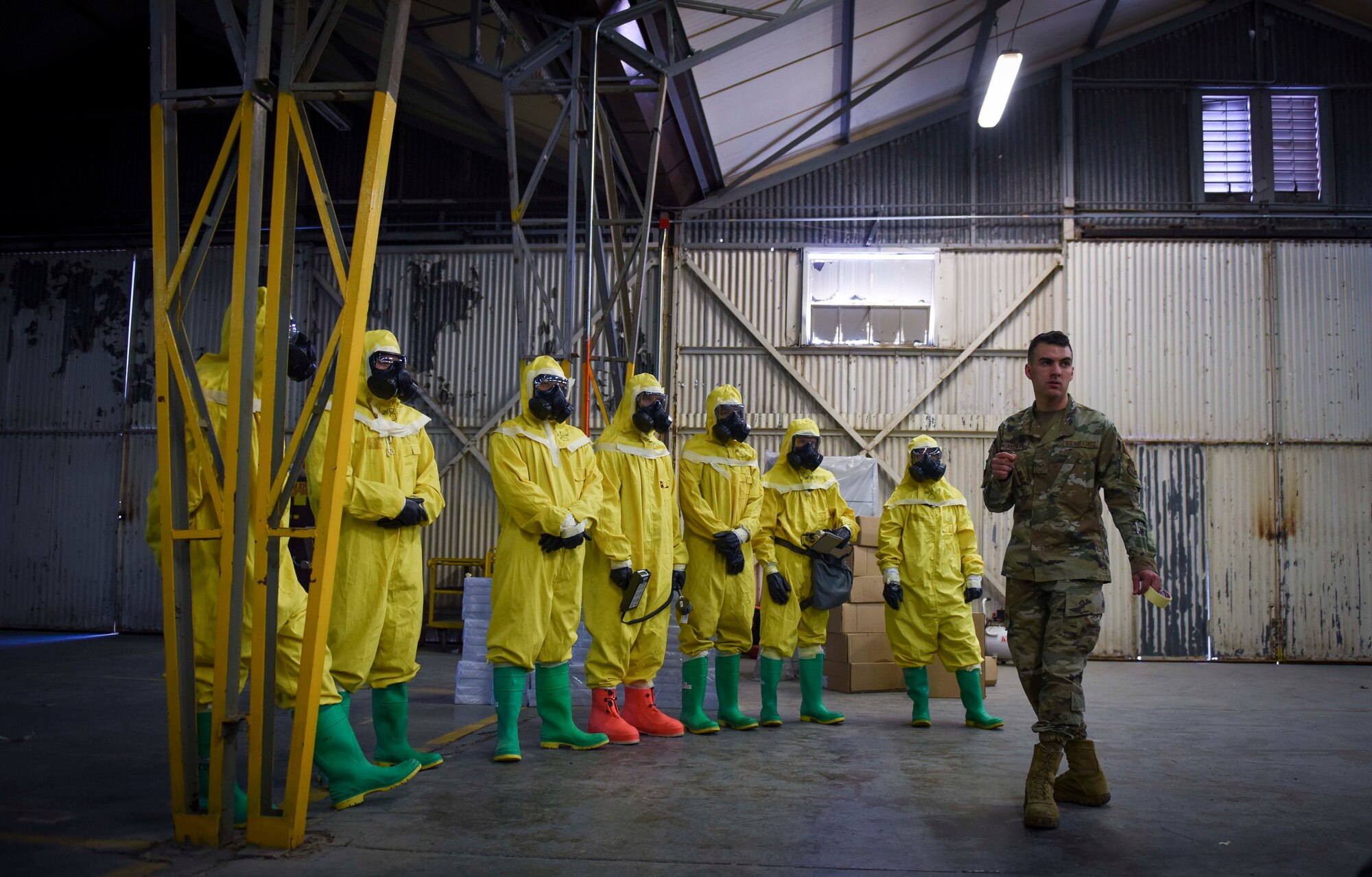 Photo of an Airman giving a brief to exercise participants