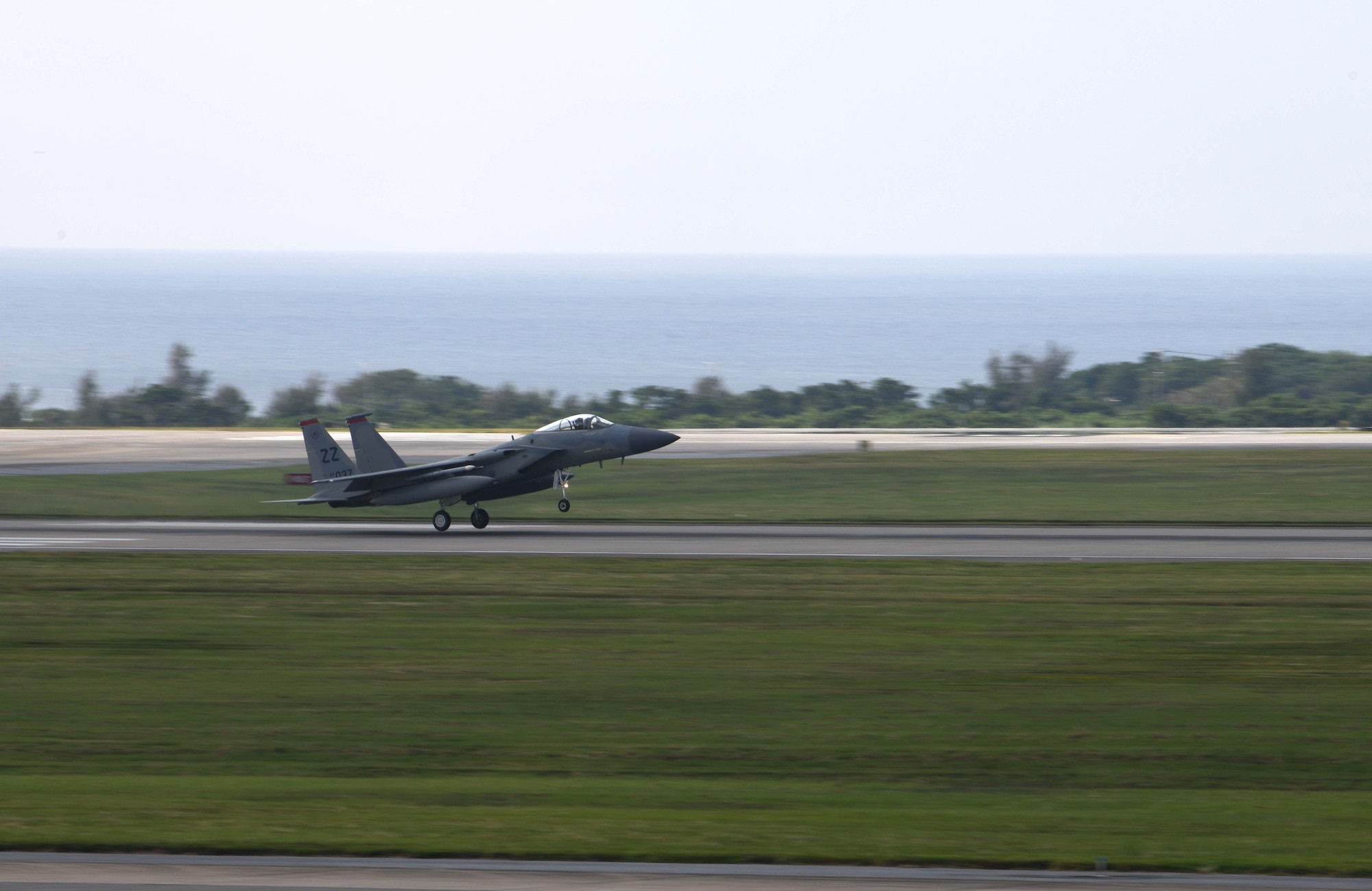 An F-15C Eagle practices landing procedures on the flightline during Exercise WestPac Rumrunner at Kadena Air Base, Japan, Oct. 16, 2020. “Rumrunner 3.0 was an awesome, high-end training opportunity for the F-15 pilots of the 44th and 67th Fighter Squadrons at Kadena,” said Lt. Col. Van Beusekom, 67th FS commander. “We launched 45 U.S. Air Force, U.S. Navy, and U.S. Marine Corps aircraft of 11 types from five locations, meeting in the airspace east of Okinawa for a major air war fought from helicopters at a few hundred feet above sea level to fighters at 50,000 feet.” (U.S. Air Force photo by Staff Sgt. Kristan Campbell)