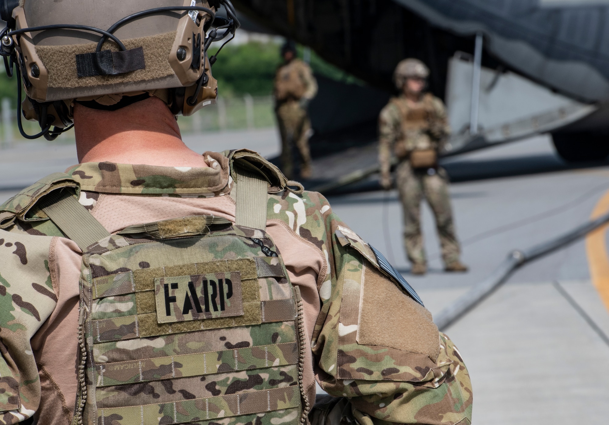 U.S. Air Force Airmen from the 353rd Special Operations Group and 18th Logistic Readiness Squadron stand-by during forward area refueling point operations for the third iteration of Exercise WestPac Rumrunner Oct. 16, 2020, at Kadena Air Base, Japan. PACAF is validating new ways to deploy and maneuver assets in order to operate in contested environments through exercises, engagements and operations like WestPac Rumrunner. The 18th Wing-led exercise represents an evolution in the capabilities of 18th Wing assets to work with joint partners to defend American allies and ensure a free and open Indo-Pacific. (U.S. Air Force photo by Tech. Sgt. Micaiah Anthony)