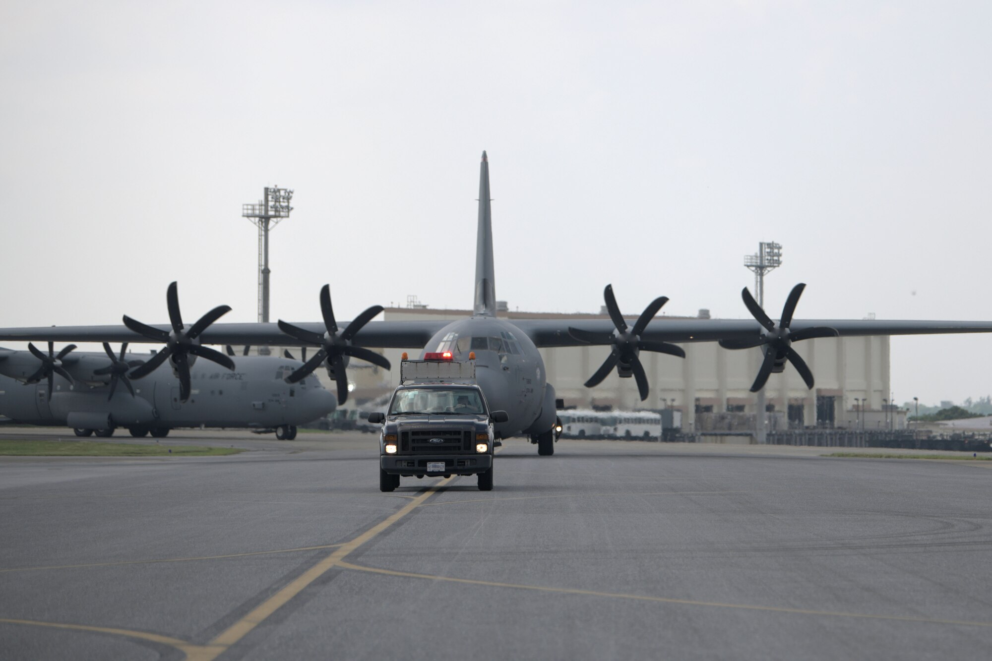 Two C-130J Super Hercules’ from the 374th Airlift Wing, Yokota Air Base, Japan, taxi on Kadena Air Base, Japan, for the third iteration of WestPac Rumrunner held Oct. 16, 2020. This exercise represents an evolution in training to adapt to the environment of great power competition. Air assets from United States Air Force, Navy, and Marine Corps units throughout the region participated in the exercise in addition to E-3s, F-15s, KC-135s, HH-60s, MC-130s and P8s from Kadena Air Base. (U.S. Air Force photo by Airman 1st Class Rebeckah Medeiros)