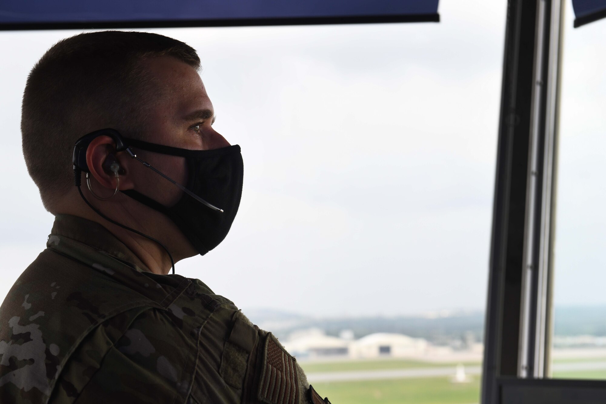 Senior Airman Andrew Jeffers, tower controller assigned to the 18th Operations Support Squadron, directs air traffic during Exercise WestPac Rumrunner at Kadena Air Base, Japan, Oct. 16, 2020. “At Kadena’s Air Traffic Control Tower, we utilize our training and experience inorder to create an efficient and safe environment for the aircraft to depart and recover,” said Master Sgt. Ashleigh Gore, tower chief controller. “During Westpac Rumrunner, we have to leanon our prior knowledge and skills in order to maximize our service capabilities to accommodate for the addition of various aircraft characteristics. The controllers view this as a welcomed challenge and look forward to the different operations that occur during the exercise.” (U.S. Air Force photo by Staff Sgt. Kristan Campbell)