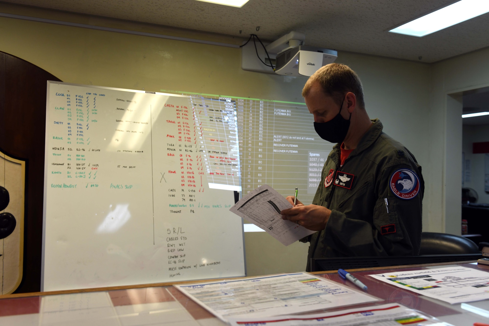 Lt. Col. Craig Van Beusekom, commander of the 67th Fighter Squadron, conducts command-and-control operations while communicating with pilots from the 67th FS during Exercise WestPac Rumrunner at Kadena Air Base, Japan, Oct. 16, 2020. “Rumrunner 3.0 was an awesome, high-end training opportunity for the F-15 pilots of the 44th and 67th Fighter Squadrons at Kadena,” Van Beusekom said. “The overall mission was remarkable--we launched 45 U.S. Air Force, U.S. Navy, and U.S. Marine Corps aircraft of 11 types from five locations.” (U.S. Air Force photo by Staff Sgt. Kristan Campbell)