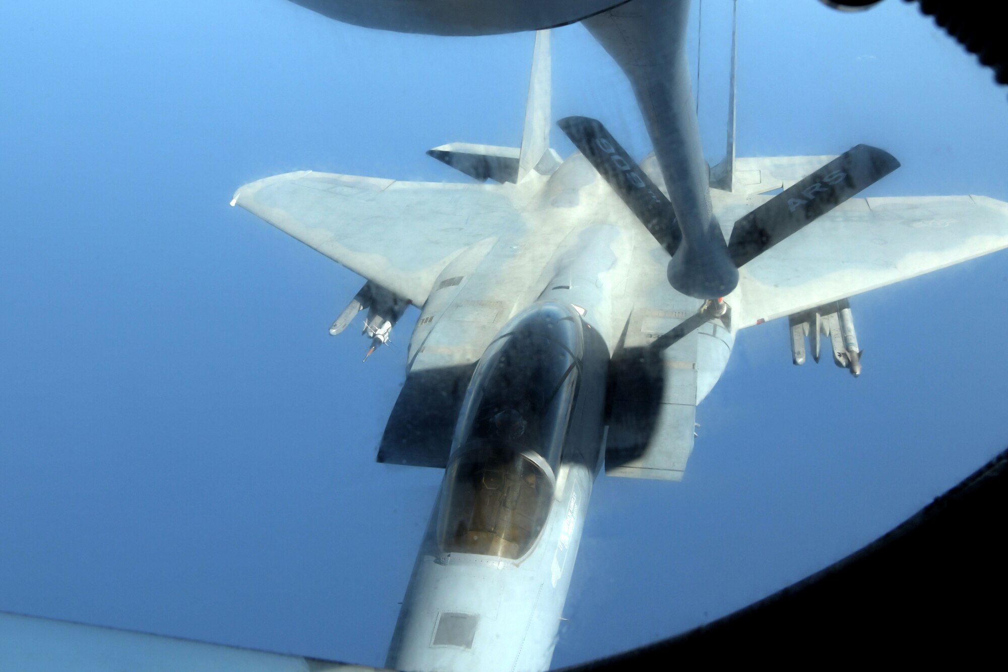 An F-15D Eagle from the 44th Fighter Squadron receives aerial refueling by a KC-135 Stratotanker from the 909th Air Refueling Squadron during the third iteration of Exercise WestPac Rumrunner, Oct. 16, 2020 from Kadena Air Base, Japan. The exercise provided opportunities to hone critical expeditionary skillsets and increase interoperability in support of a free and open Indo-Pacific. Projecting combat air power has its own set of challenges and having the opportunity to practice that capability is crucial in enhancing the 18th Wing’s agile combat employment skills. (U.S. Air Force photo by Airman 1st Class Rebeckah Medeiros)