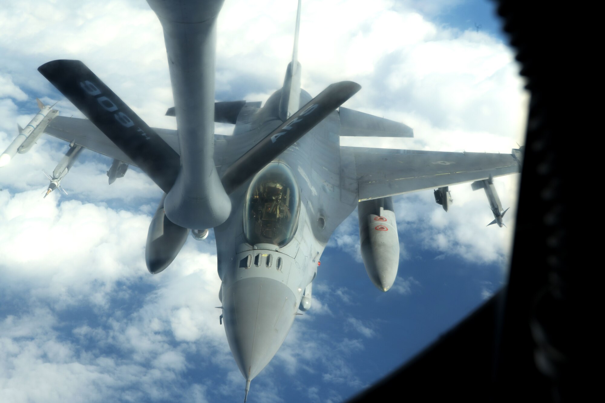 U.S. Air Force F-16 Fighting Falcon from the 35th Fighter Wing, Misawa Air Base, Japan, prepares to be refueled by a KC-135 Stratotanker from Kadena Air Base, Japan, during the third iteration of Exercise WestPac Rumrunner, Oct. 16, 2020. WestPac Rumrunner enables units and assets currently stationed or on Temporary Duty in the Western Pacific area of responsibility to train together without the typical demands of a TDY. The exercise incorporated over 45 aircraft from across the services including the U.S. Air Force, U.S. Navy, and U.S. Marine Corps. (U.S. Air Force photo by Airman 1st Class Rebeckah Medeiros)